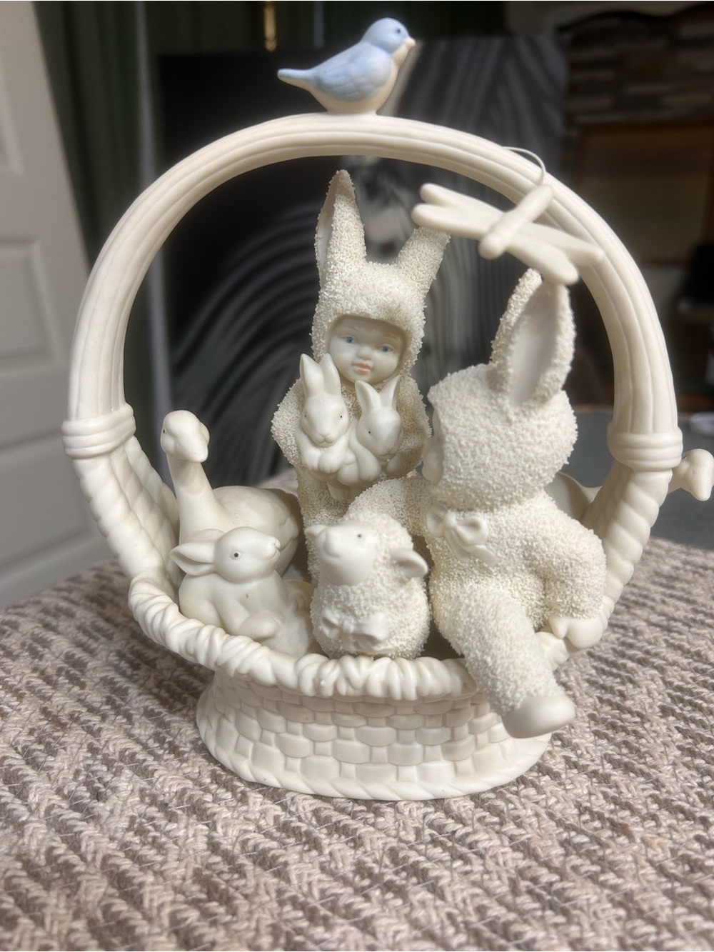 Ivory Ceramic Bunny Basket Figurine